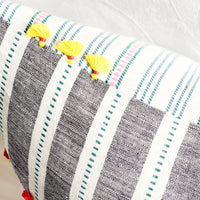 3: Two sided pillow detailing with tassels.