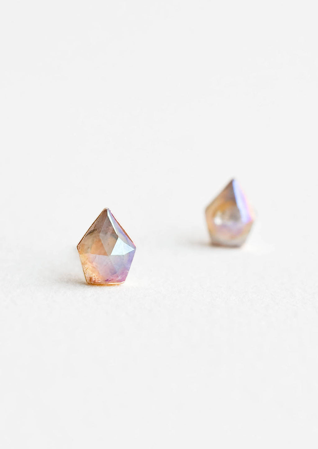 1: Faceted, gemstone shaped earrings with rainbow-like iridescent finish.