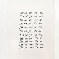 1: Art print featuring repeated rows of handwritten text, starting with "It's not you, it's me" and ending with "It's not me, it's you"