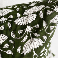 3: A block printed pillow in green and ivory floral motif.