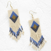 Cream / Cobalt / Gold: Ivory beaded fringe earrings with blue, gold and navy diamond design.