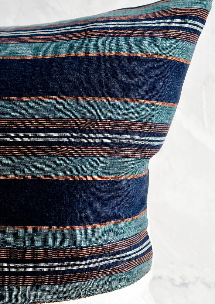 Striped japanese hemp fabric in indigo, teal, orange and white.