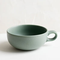 Juniper: A ceramic bowl mug in juniper green.