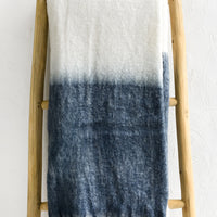 Stone Blue: A mohair throw blanket in white and stone blue with long fringe trim.