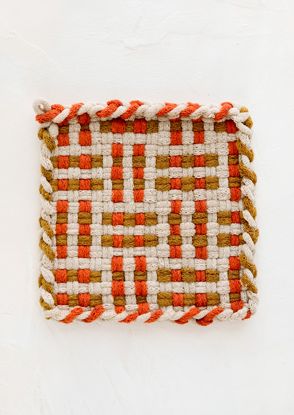 Brick / Ochre / Tan: A hand-knit potholder in spice red and ochre woven pattern.