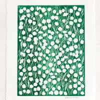 1: A block printed art print on deckled edge paper with green box with white flowers.