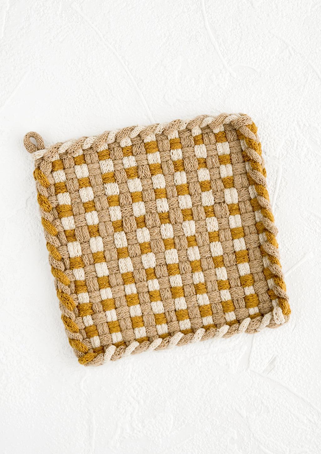 Ochre / Ivory / Taupe: A hand-knit potholder in checkered weave of ochre, taupe and natural.