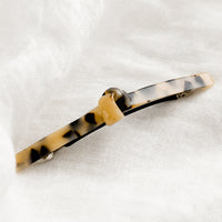 Blonde Tortoise: Acetate barrette with knot detail in tortoise
