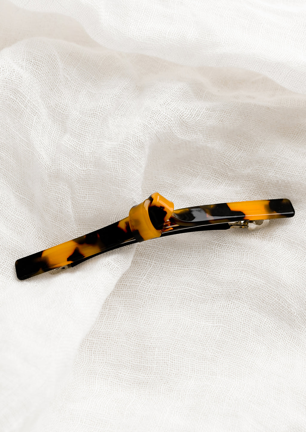 Tortoise: Acetate barrette with knot detail in tortoise