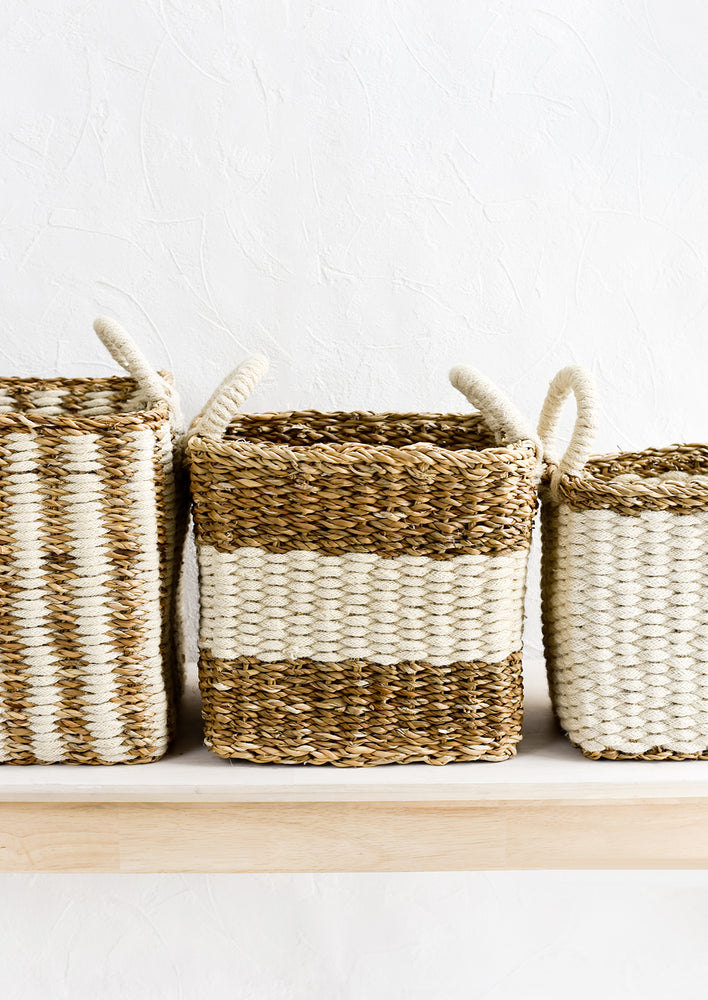 2: Jute and straw storage baskets in incremental sizes.