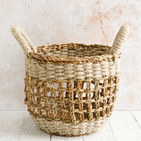 Small [$45.99]: A small open-top round storage basket made from seagrass with braided jute, featuring two handles at top.