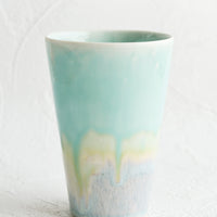 Aqua / Blue: A ceramic cup in aqua.