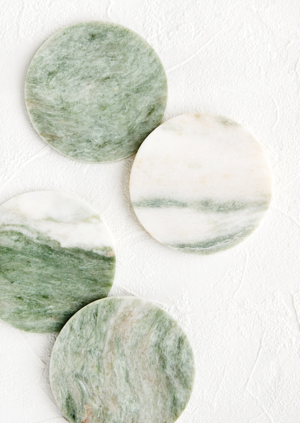 Round: Set of 4 round coasters in green and white marbled "lady onyx"