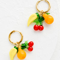 2: Gold hoop earrings with glass banana, cherry and orange fruit charms.