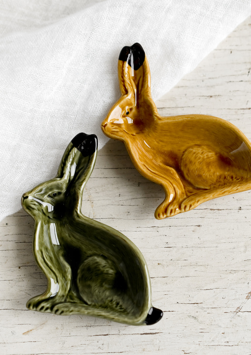 2: Rabbit shaped trinket dishes in green and brown.