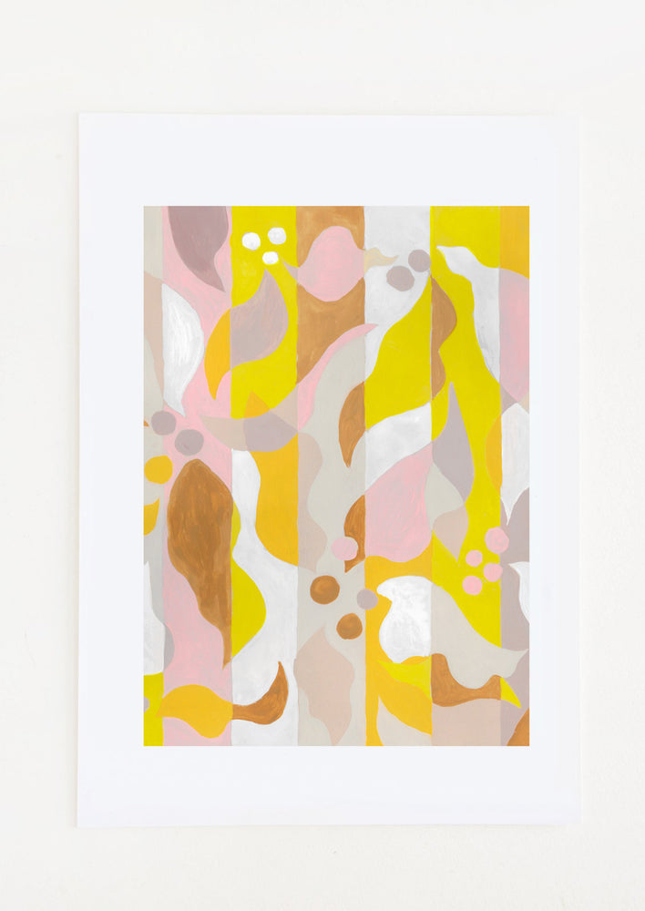 An abstract art print in tones of yellow, pink, brown and orange.