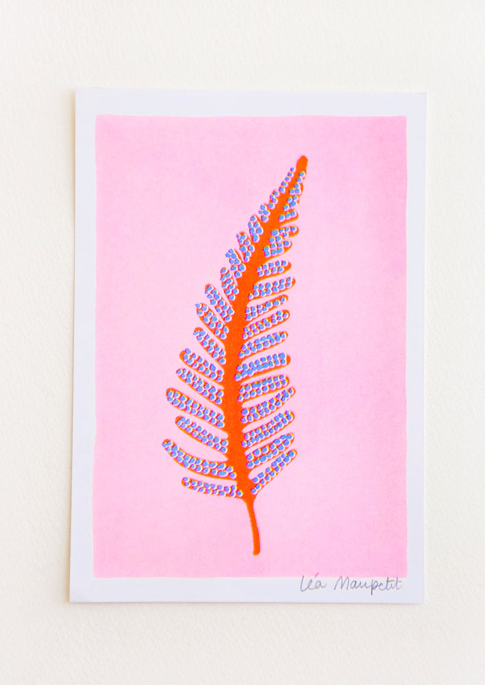 Risograph art print with neon pink background and orange and purple fern frond