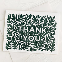 Single Card: A set of greeting cards with green leaf print reading "Thank You".
