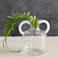 Small: A clear glass vase in short shape with two white handles at top.