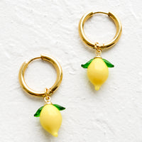 2: Gold huggie hoop earrings with glass lemon charms.