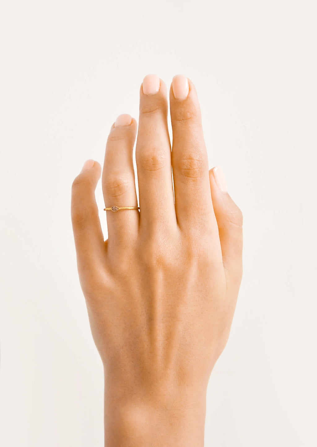 2: Model shot showing hand wearing diamond ring.