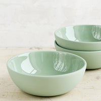 Moss: Matte porcelain bowls in moss green hue with glossy interior.