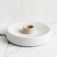 Single / White / Sand: A round ceramic taper candle holder in white and sand.