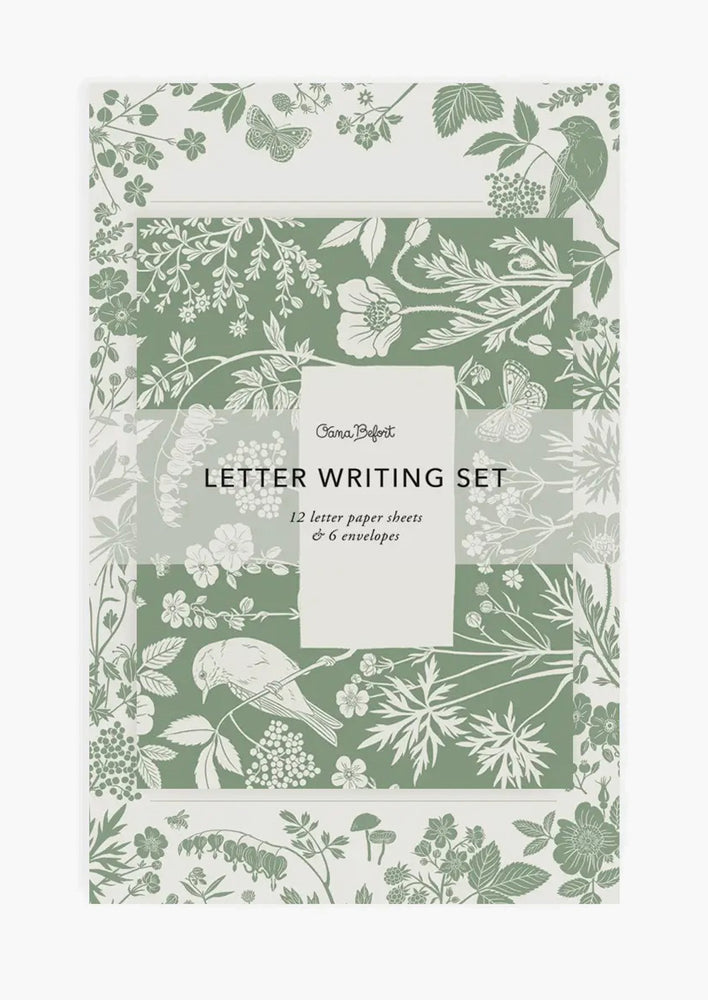 Green and white floral and bird print letter kit.