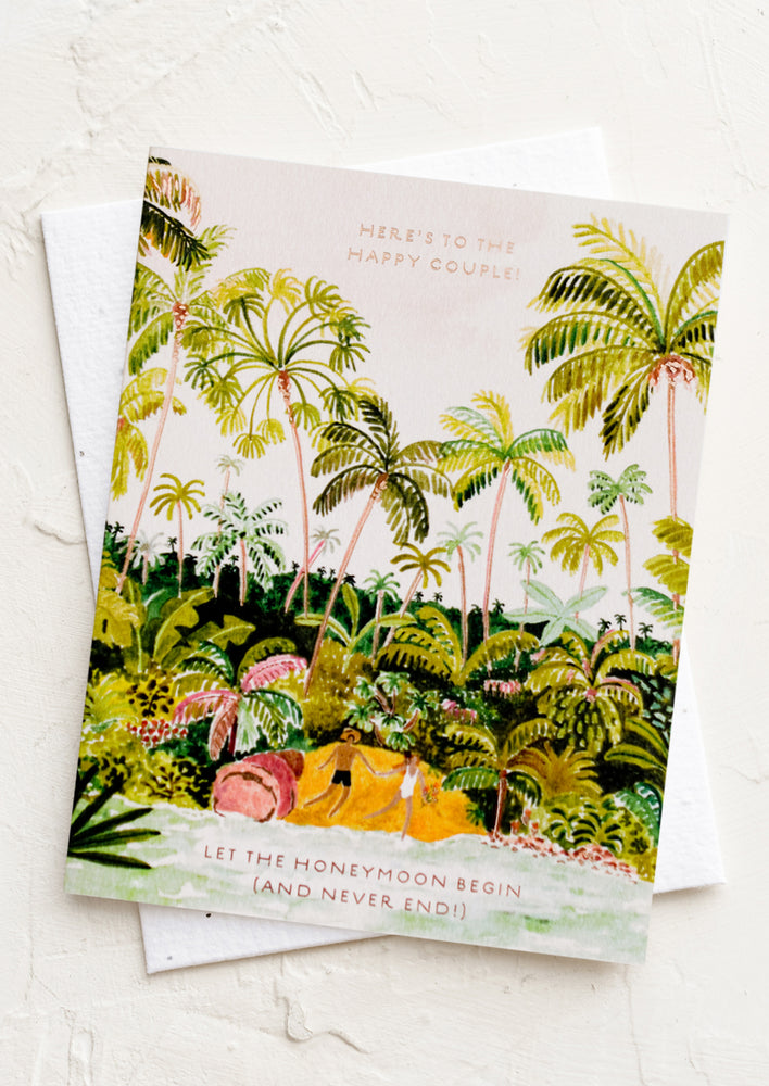 1: A card with illustration of couple in tropical area, text reads "Let the honeymoon begin (and never end)".