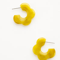 Split Pea: Acetate earrings in the shape of a daisy-like flower, marbled split pea green color