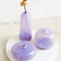Bubble / Lavender: A trio of translucent lavender glass vases in a mix of shapes and sizes.