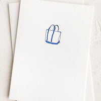 Boat Bag: A plain white card with small boat bag icon at front.