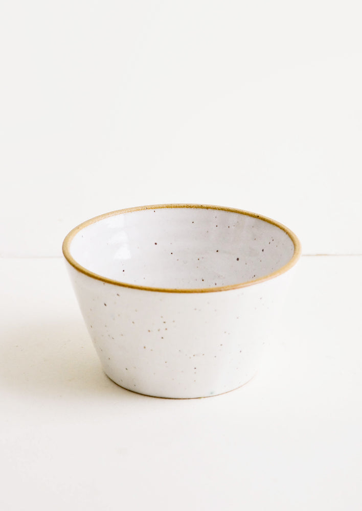 Handmade ceramic rice bowl in speckled white glaze