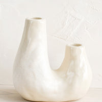 5: A ceramic 2-taper holder in barnacle-like shape.