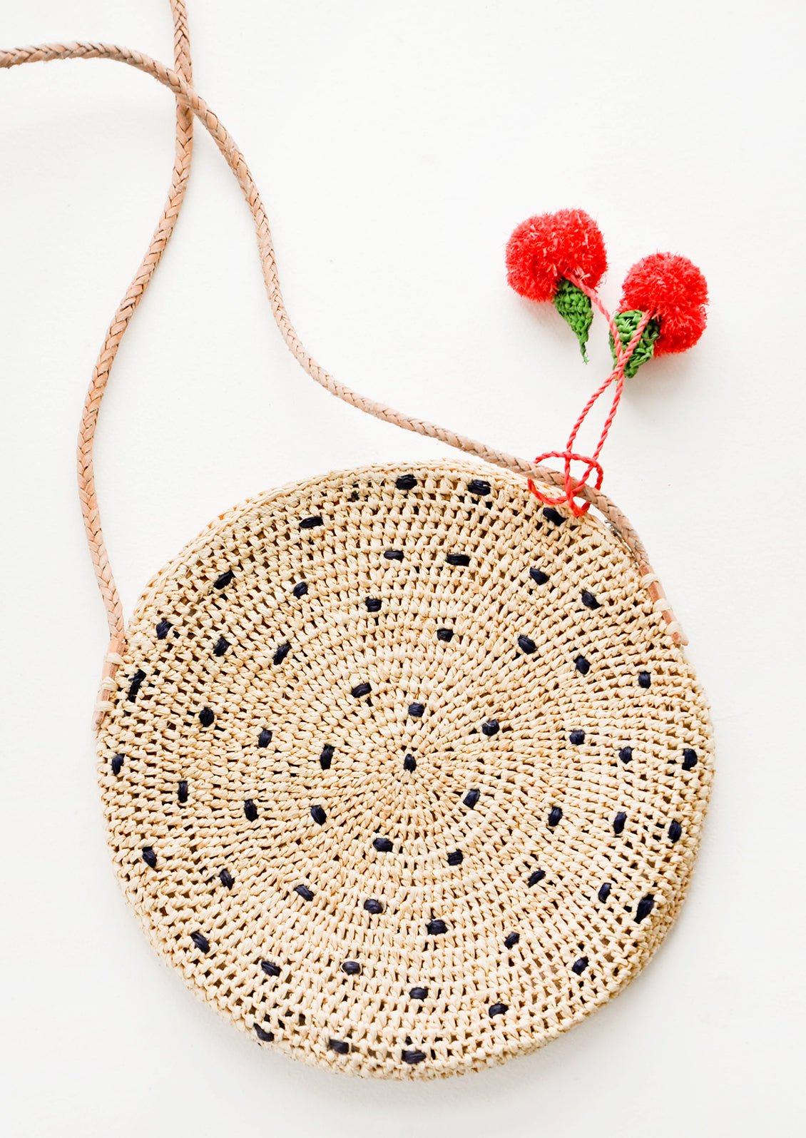 Fruit Pom Straw Crossbody Bag in  - LEIF