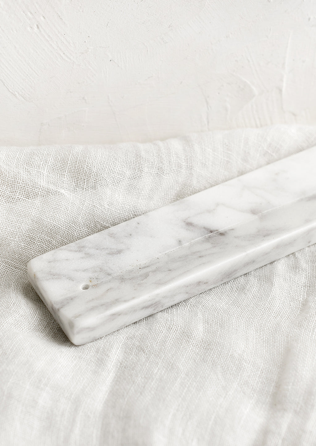 3: A long solid marble incense burner tray.