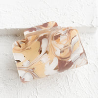 Taupe Multi: A rectangular acetate hair clip in marbleized taupe.