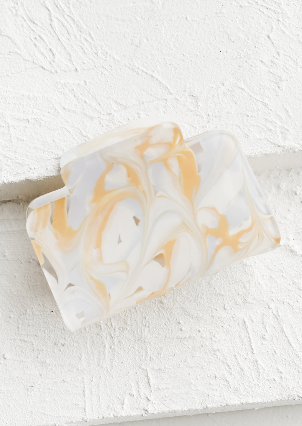 White Multi: A rectangular acetate hair clip in marbleized white.
