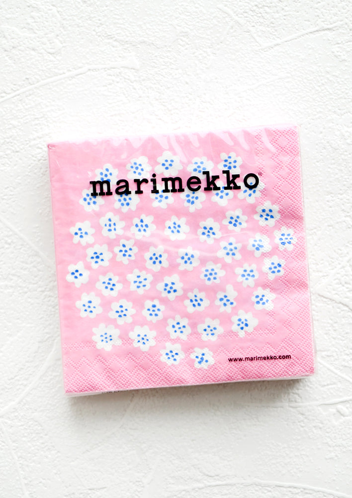 Pink Floral: Packaged disposable paper napkins in square cocktail size with pink, blue and white floral print.