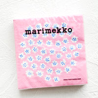 Pink Floral: Packaged disposable paper napkins in square cocktail size with pink, blue and white floral print.