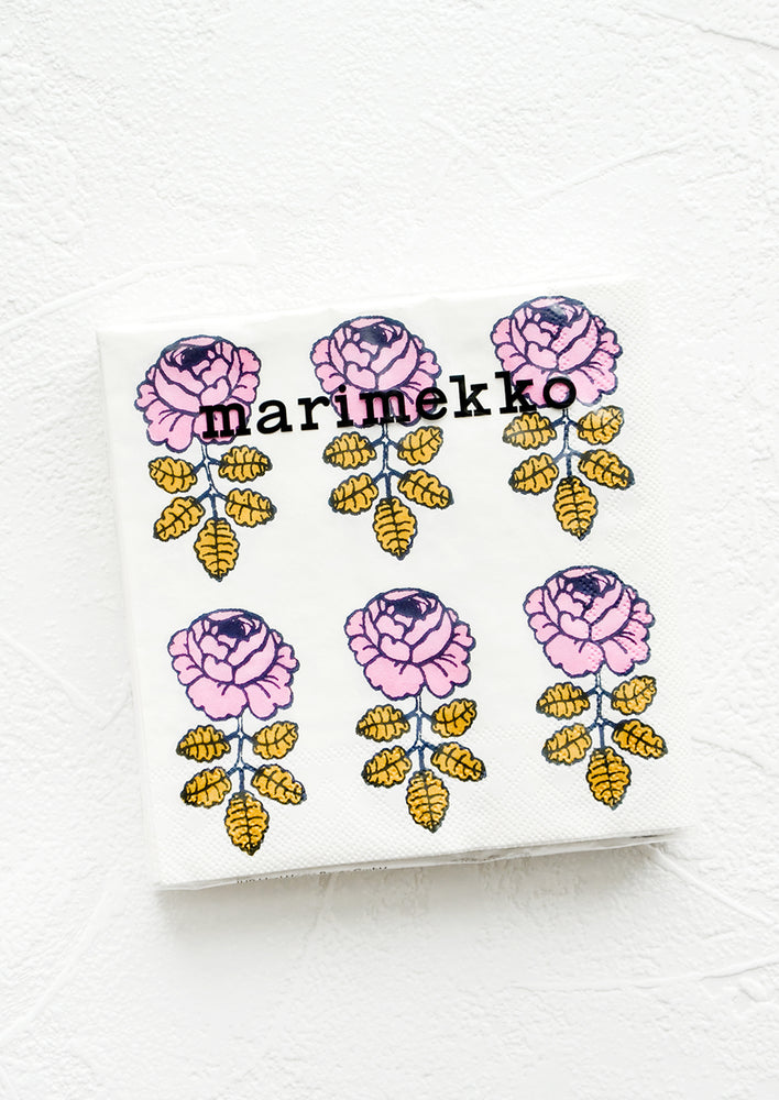 Packaged disposable paper napkins in square cocktail size with pink and yellow floral print.