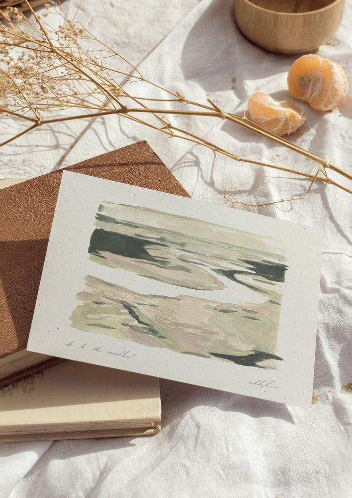 An art print of a pastel sage green painting of marshland.