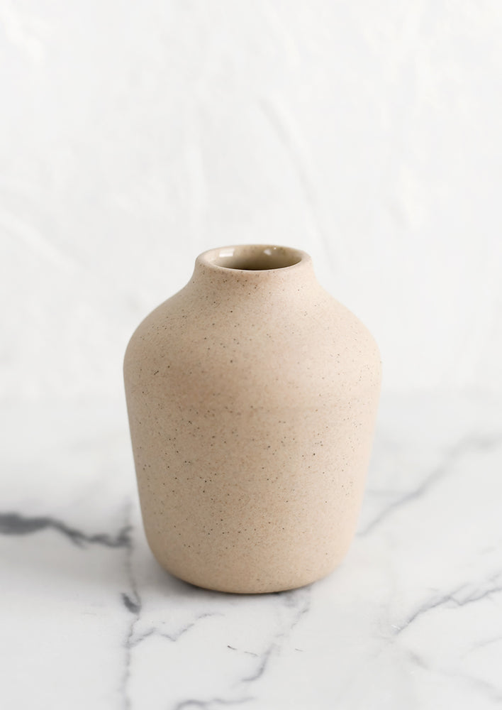 Sand: A sand colored porcelain bud vase.