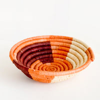 Coral / Wine Multi: Small raffia bowl in geometric pattern in coral, wine and natural