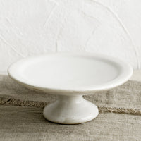 Small / White: A white ceramic pedestal riser.