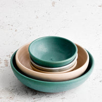 3: Stack of handmade ceramic bowls in nesting sizes