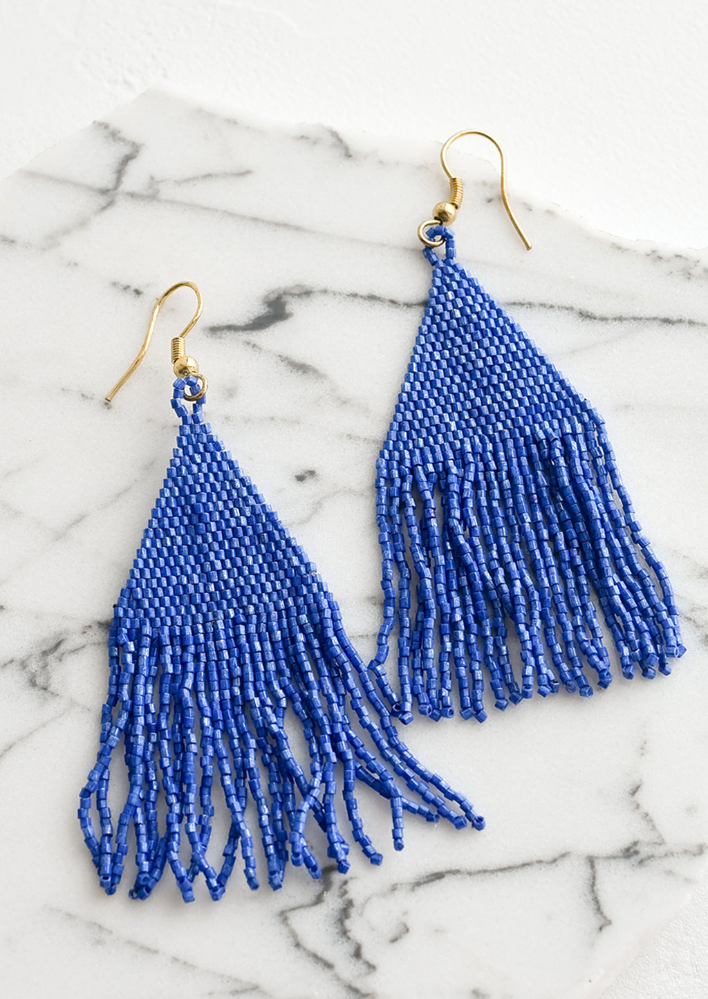 Lapis: Metallic cobalt blue triangular fringe beaded earrings.