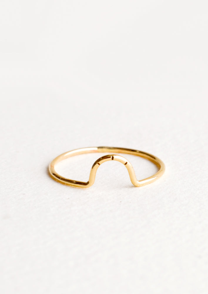1: Thin gold ring showcasing small arced feature with three etched lines. 