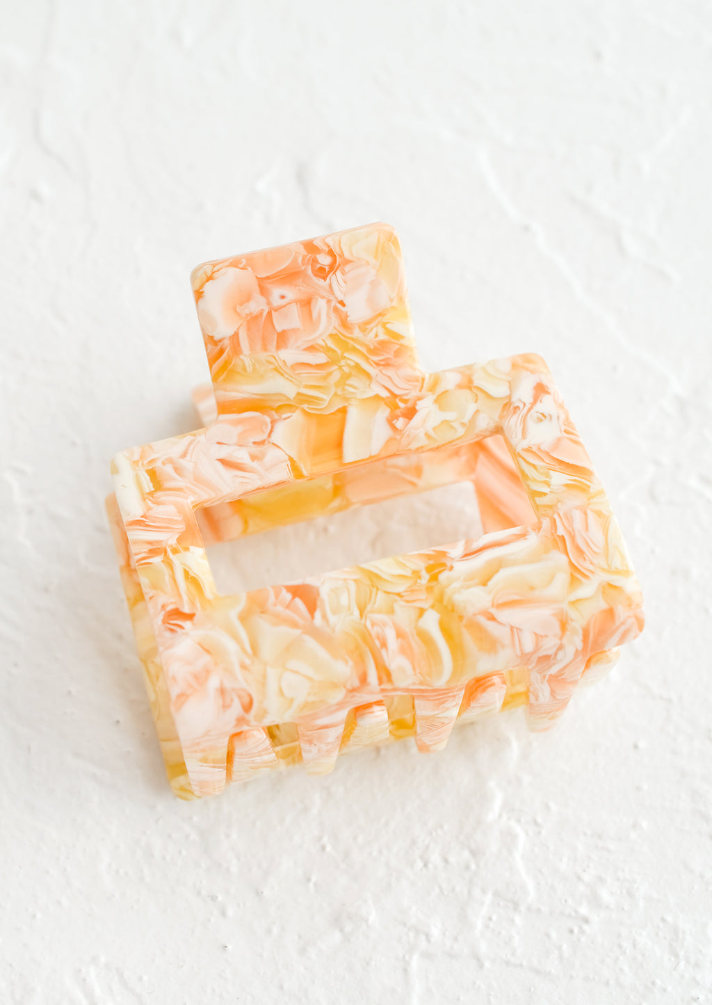 Citrus Marble: A marbled hair clip in orange marble.