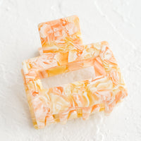 Citrus Marble: A marbled hair clip in orange marble.